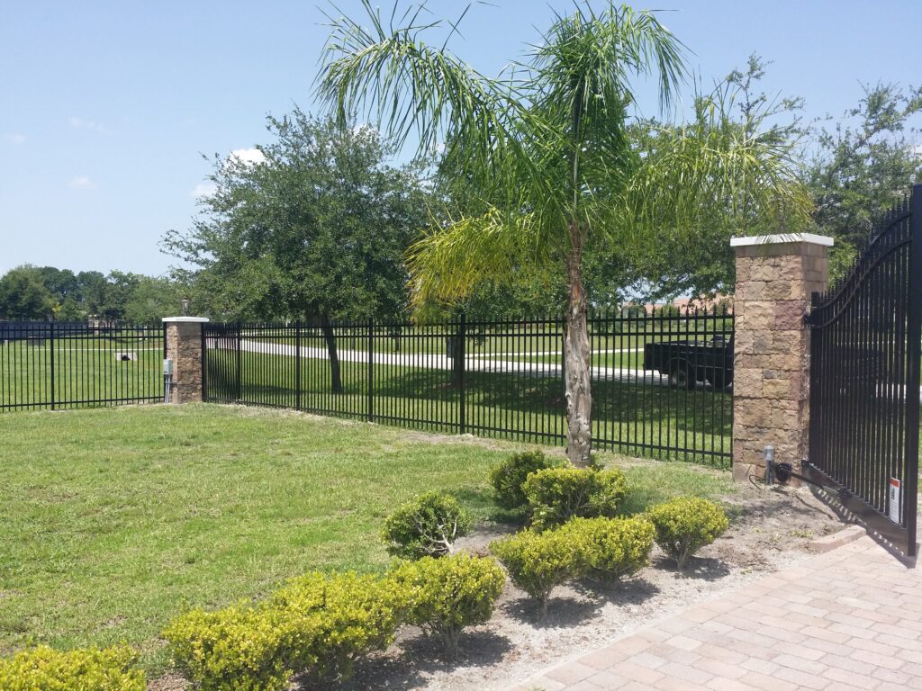 This aluminum fence added needed framing for this gorgeous landscape in ocala