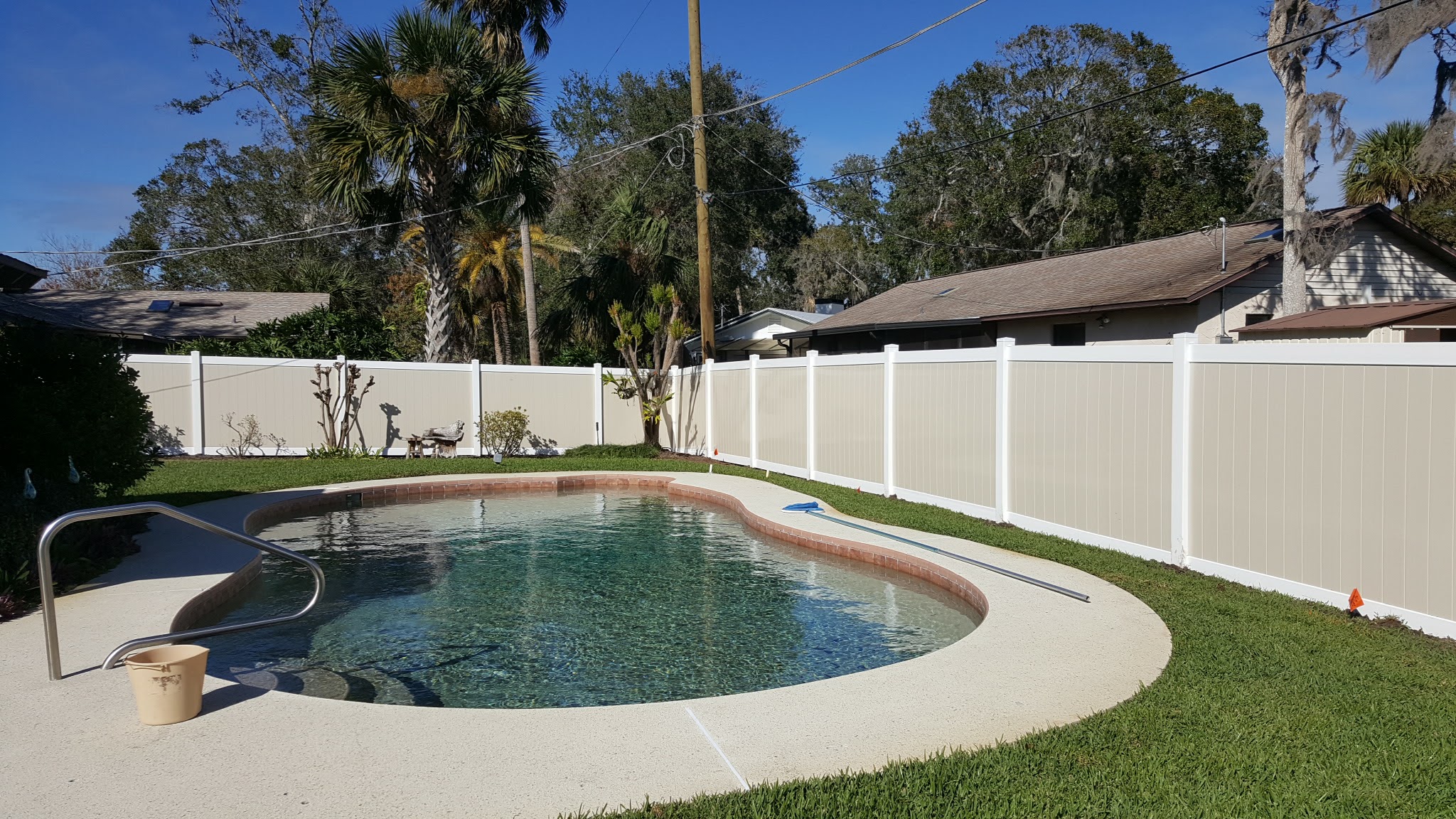Residential Fence Installation around a pool in ocala florida.