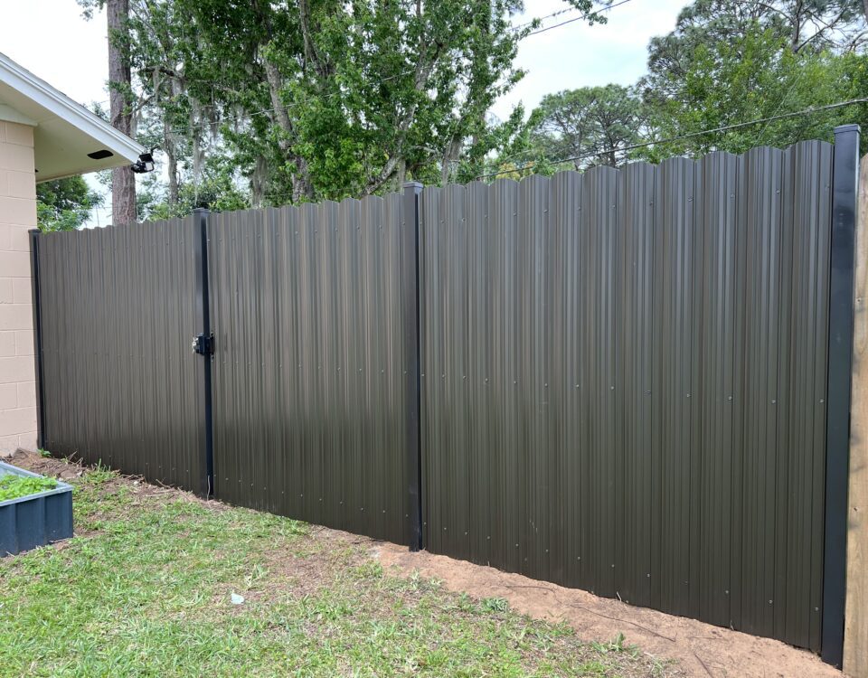 Dura Fence as a dark grey with matching gate