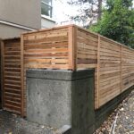 Horizontal wood privacy fence installed on a residential property in Central Florida